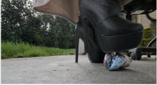 Crushing cans, glass, and a cigarette in high heeled boots