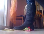 Sexy girl crushing flowers with boots